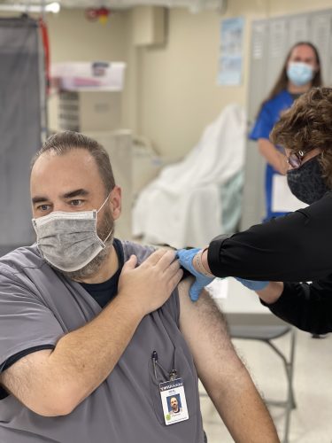 A COVID Doctor’s Journey: Aulick Looks Back at a Year of the Pandemic